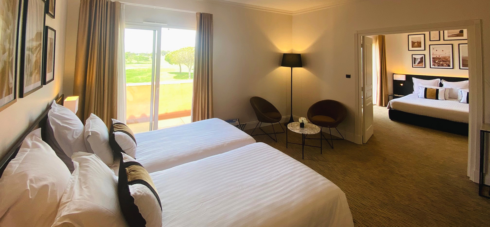 View of a suite with 1 double bed at the Palmyra Golf, a hotel with a spa in Occitanie